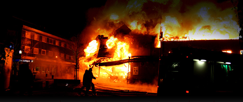 Firefighters responding to a structure fire
